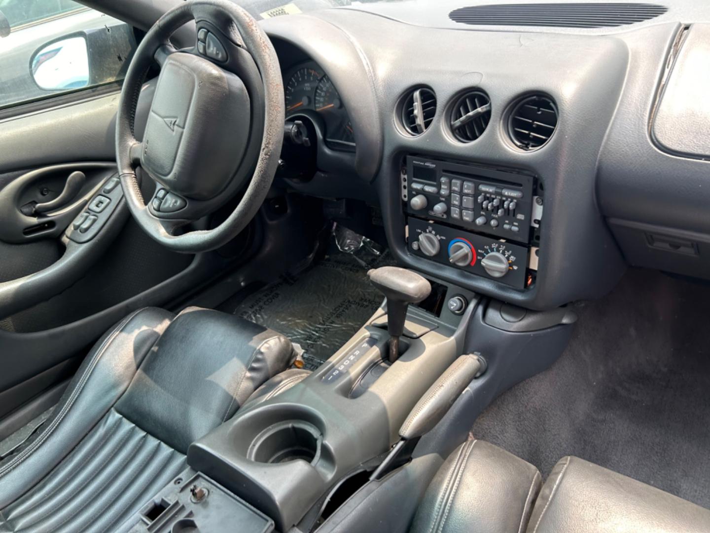 1999 Blue Pontiac Firebird (2G2FV22G6X2) with an 5.7L V8 F OHV engine, Automatic transmission, located at 1687 Business 35 S, New Braunfels, TX, 78130, (830) 625-7159, 29.655487, -98.051491 - Photo#7